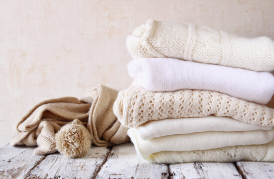 Stack of white sweaters